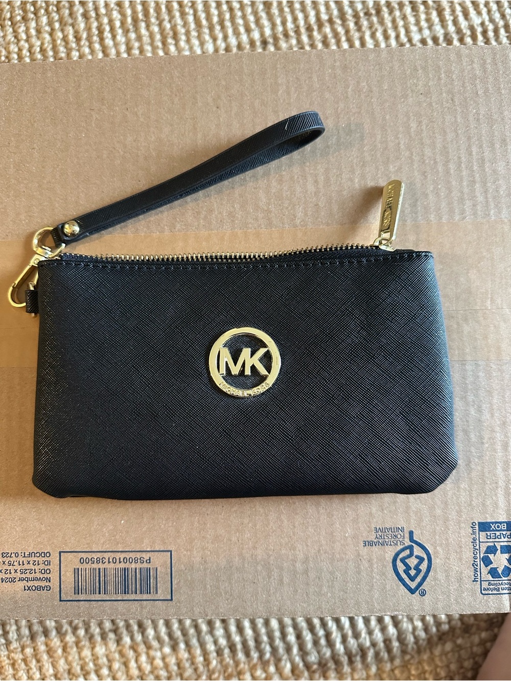 Micheal kohrs wristlet